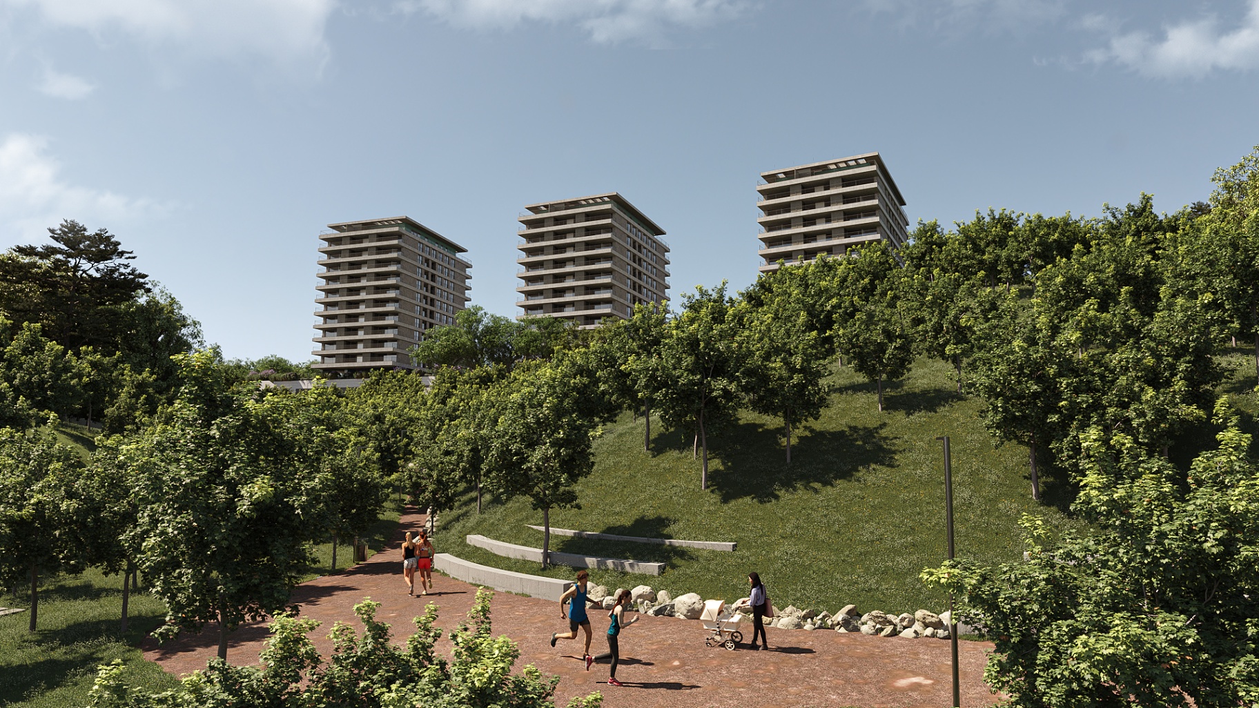 Vista panorâmica dos três edifícios sobre a colina verde